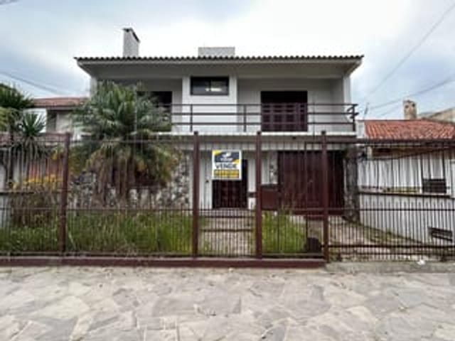 Casa com 300m² 4 quartos e 4 banheiros, à venda ou para alugar, no bairro Três Vendas em Pelotas
