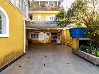 Foto do Sobrado-Sobrado para venda em Vila Yolanda com 4 quartos, sendo 2 suítes, 164m²
