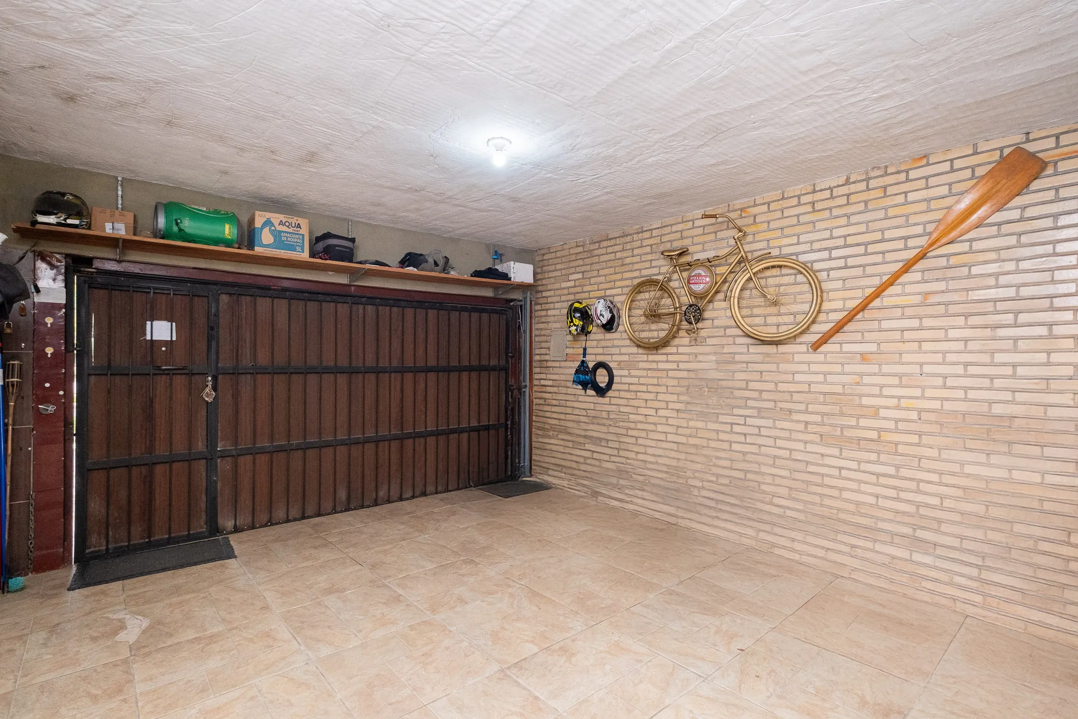 Casa à venda no Areal, Pelotas - 200 m², 2 quartos (sendo 1 suíte), lareira, sacada e espaço gourmet com churrasqueira e garagem. - 15