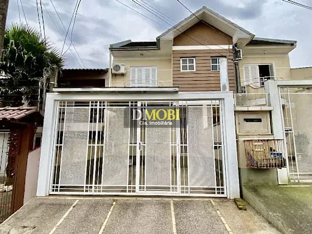 Sobrado com 130m² 4 quartos e 2 banheiros, à venda ou para alugar, no bairro Loteamento Jardim Timbaúva em Gravataí
