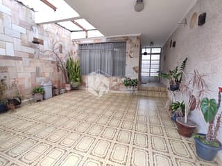 Foto do Sobrado-Sobrado para venda em Vila Guilhermina com 4 quartos, 160m²