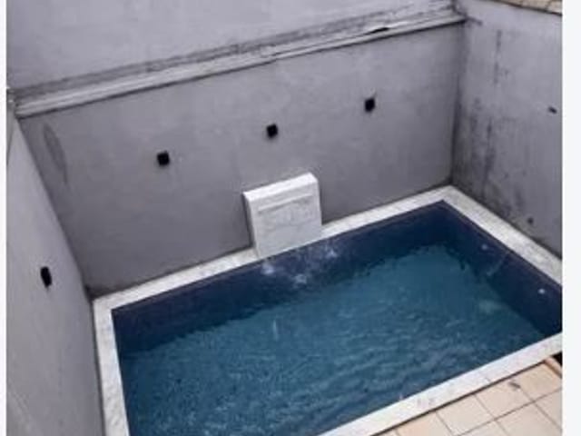 Foto do Sobrado - Excelente sobrado à venda, totalmente reformado, com piscina, na região do Jardim Vila Galvão, Guarulhos, SP | Imobiliária Compare