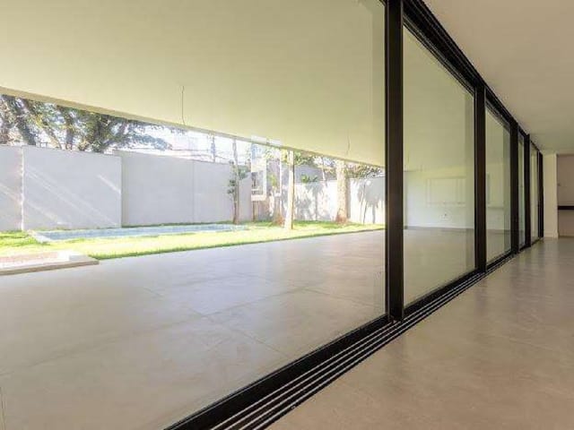 Foto do Sobrado - Sobrado à venda em condomínio fechado com 838m², 4 quartos, 4 suítes, 6 vagas de garagem na Chácara Santo Antônio (Zona Sul), São Paulo-SP | Paulista Imóveis