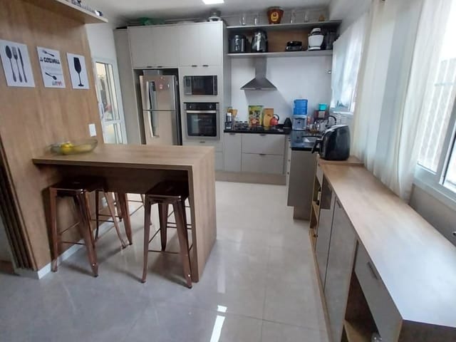 Foto do Sobrado - Sobrado em Condomínio Fechado, com 03 Dormitórios, sendo 01 Suite, 01 Banheiro social, 03 Vagas cobertas | Paulista Imóveis