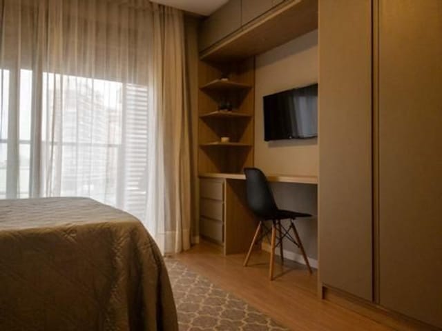 Foto do Studio - Studio mobiliado à venda no Inn, Parque Una - 35 m², móveis planejados, sacada e condomínio impecável. | UP Imóveis