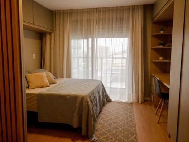 Foto do Studio - Studio mobiliado à venda no Inn, Parque Una - 35 m², móveis planejados, sacada e condomínio impecável. | UP Imóveis