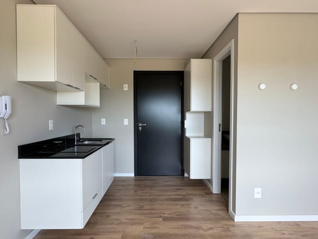 Foto do Studio - Studio no Parque Una com 26 m², sol da manhã, cozinha com cooktop, armários, box, lavanderia coletiva, portaria 24h e restaurante no condomínio! | UP Imóveis