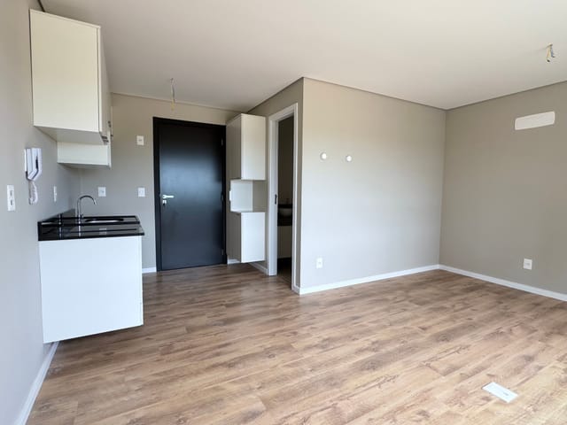 Foto do Studio - Studio no Parque Una com 26 m², sol da manhã, cozinha com cooktop, armários, box, lavanderia coletiva, portaria 24h e restaurante no condomínio! | UP Imóveis