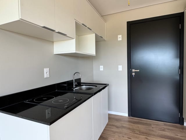 Foto do Studio - Studio no Parque Una com 26 m², sol da manhã, cozinha com cooktop, armários, box, lavanderia coletiva, portaria 24h e restaurante no condomínio! | UP Imóveis