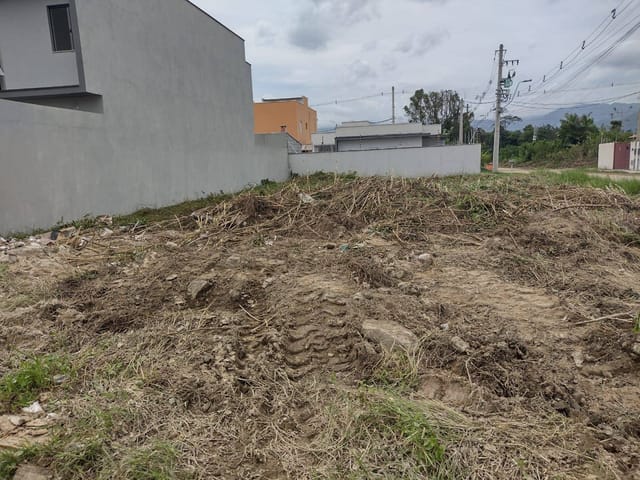 Foto do Terreno - Terreno de 300m² à venda no bairro do Golfinho em Caraguatatuba, SP - Grande Oportunidade de Investimento! | Área 12 imóveis