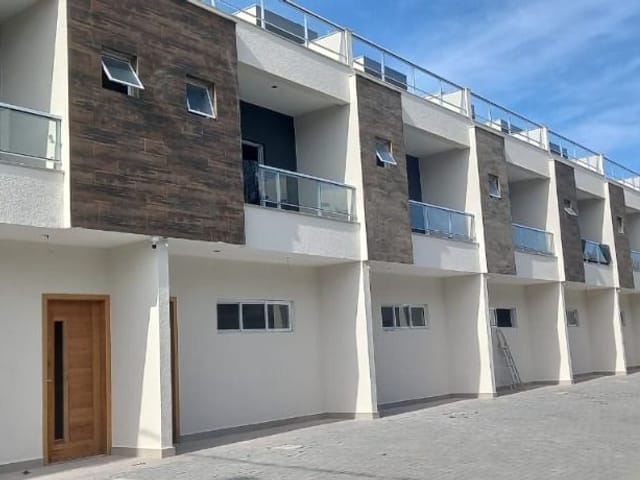 Foto do Village - Sobrado com 3 dormitórios à venda, 150 m² por R$ 540.000 - Massaguaçu - Caraguatatuba/SP | RUSSI IMÓVEIS