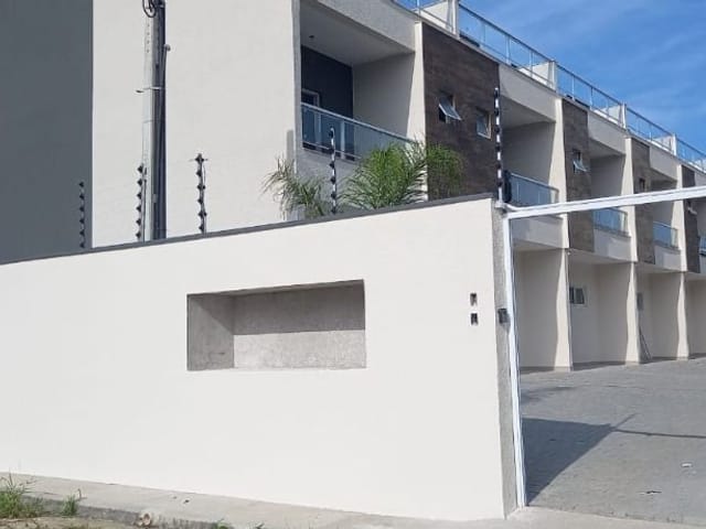 Foto do Village - Sobrado com 3 dormitórios à venda, 150 m² por R$ 540.000 - Massaguaçu - Caraguatatuba/SP | RUSSI IMÓVEIS
