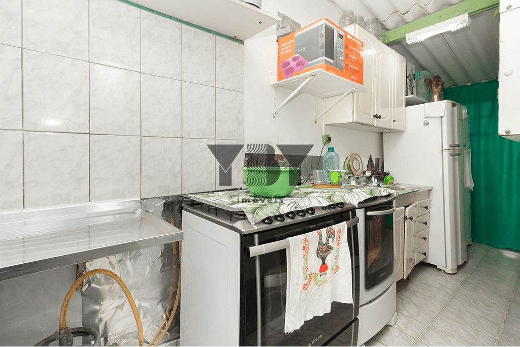 Casa à venda com 3 quartos, 100m² - Foto 4