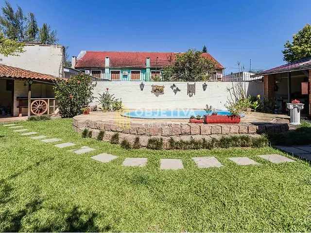 Casa 3 quartos e 3 banheiros, à venda, no bairro Guarujá em Porto Alegre